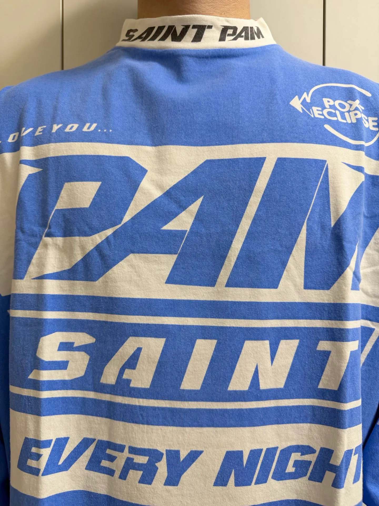 SAINT Mxxxxx Make the printing look distressed and white. Correct accessories. Customized co-branded model with P.A.M. wash mark.